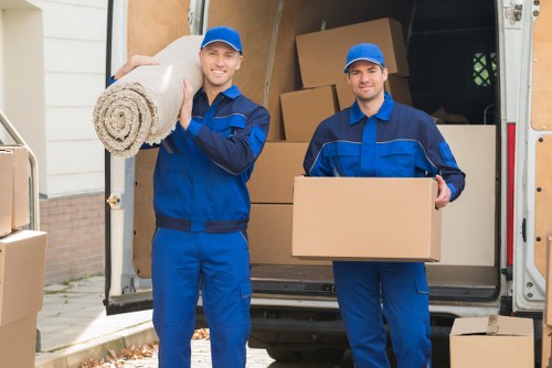 Team handling furniture and boxes during a Lambeth move