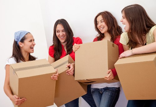 Local moving van service helping with boxes and furniture in Lambeth
